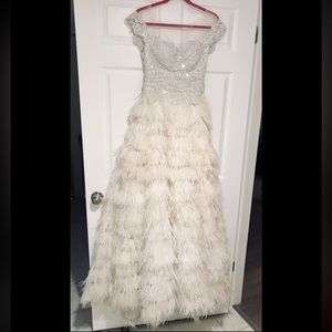 Hand beaded feather wedding gown